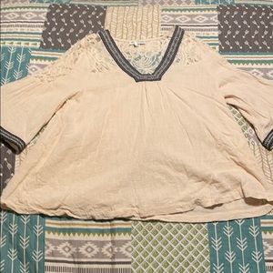 Tassels and lace blouse.